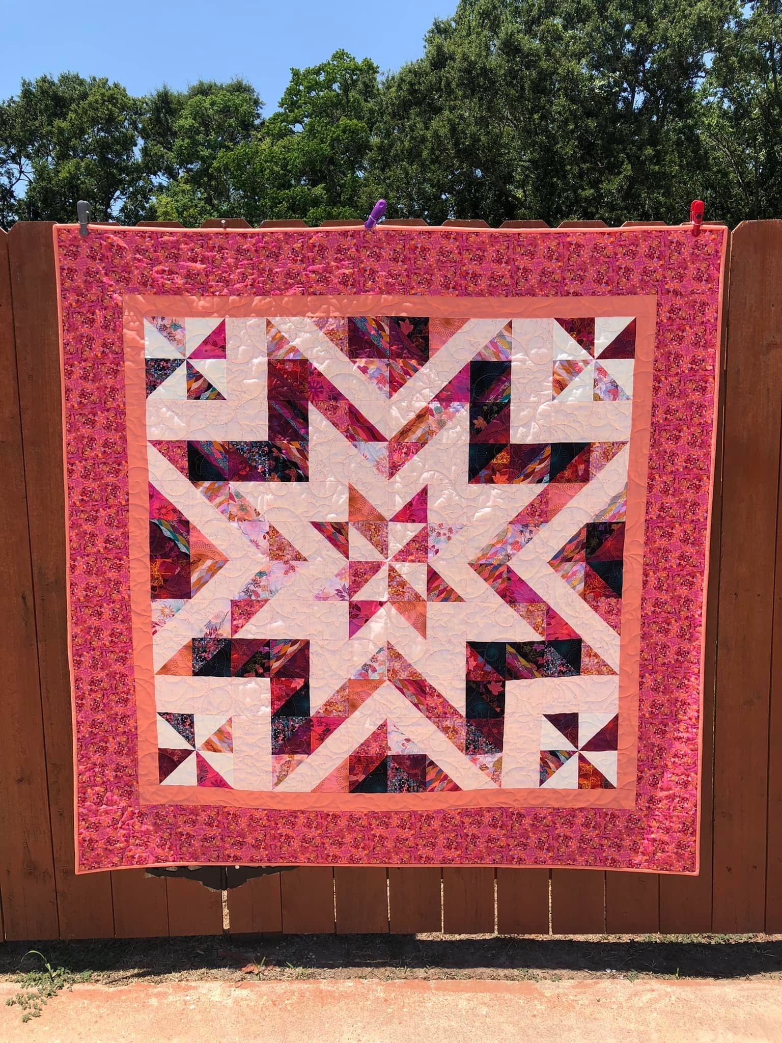 Student Teresa with her finished Guiding Star quilt