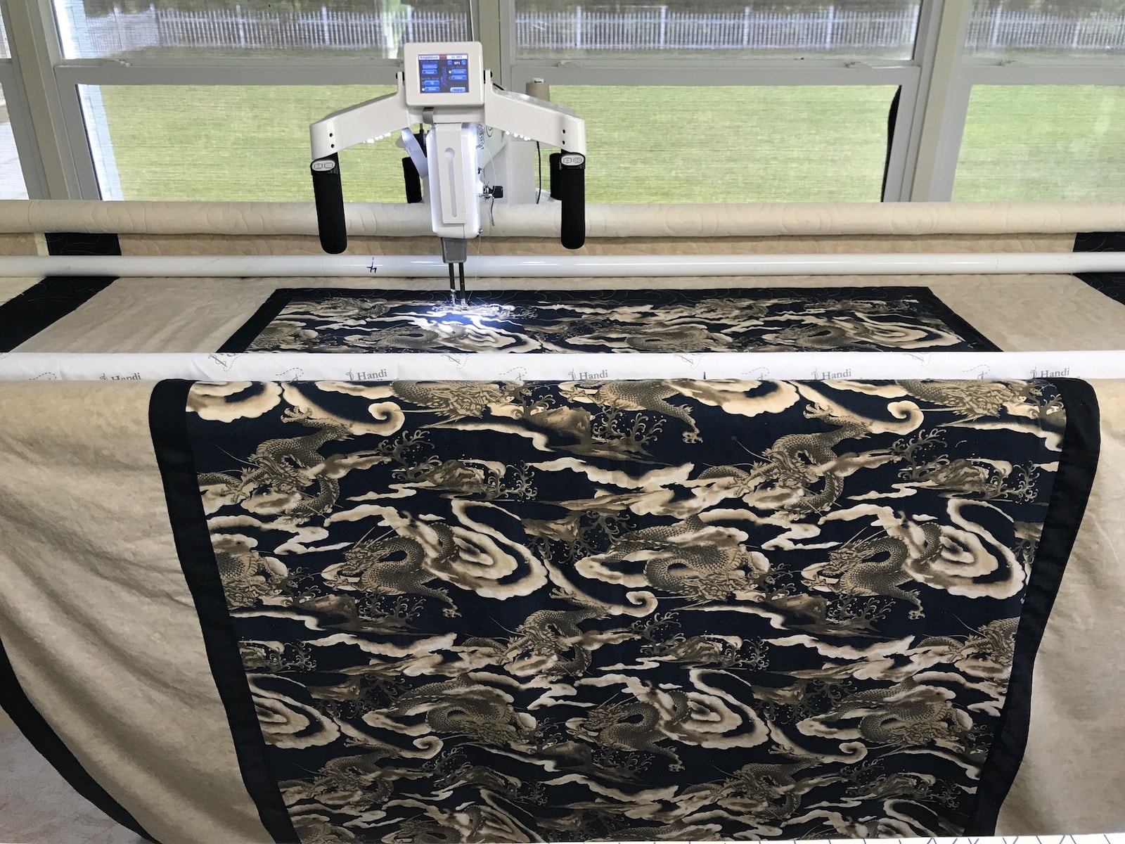 Long arm quilting machine in action
